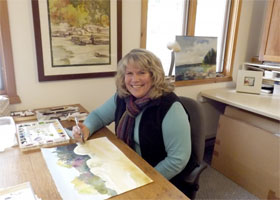 Cathy Meader at work in her home studio.