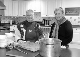 Marlene Mann, left, and Melinda Ellefson –ready to serve at a recent soup and bread supper. – Photo by Jim Morris